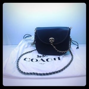 Coach 1941 Black Turnlock Crossbodt Saddle Bag.